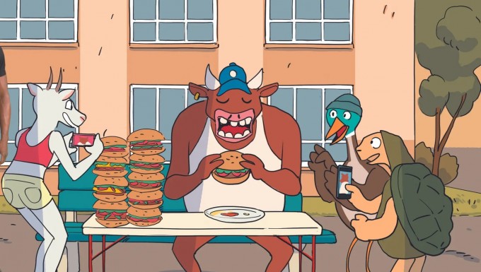 Philharmonie des Enfants - tous droits réservés Un personnage mangeant des burgers devant des animaux