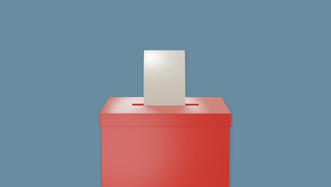 CC0 Freepik. Un bulletin de vote introduit dans une urne.