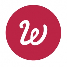 Logo Whisperies : lettre stylisée blanche sur un cercle de couleur rouge.